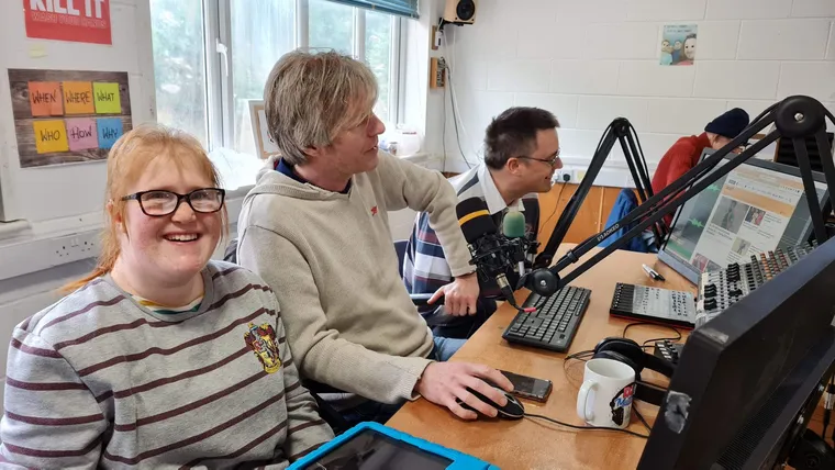 A member presenting live on Spiral Wave Radio
